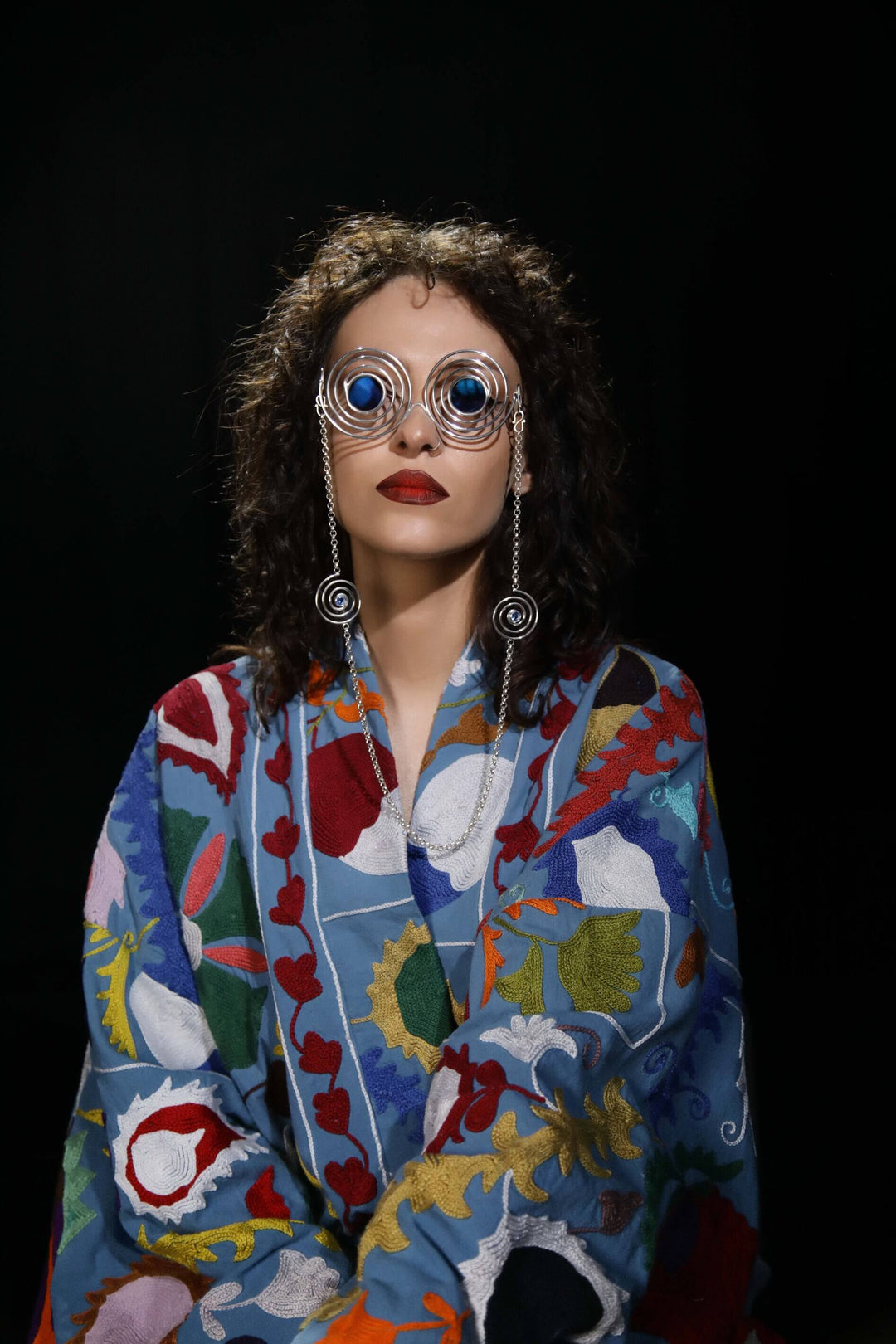 Avant-garde sunglasses Psychedelic Spirals, handmade in Sterling Silver 925 with removable chains featuring blue quartz spirals. Ideal for raves, parties, and fashion events, combining luxury and artistic design.