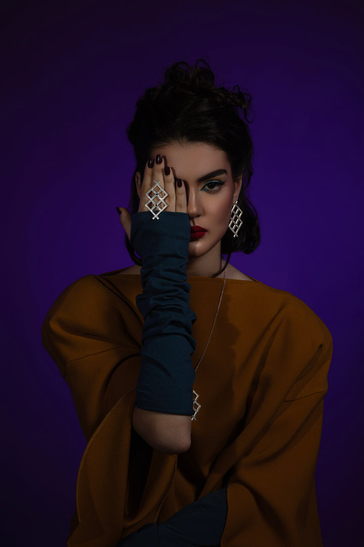 WishRune Ring: Geometric avant-garde statement design with jet stones, inspired by runes believed to grant wishes. Wish it. Wear it. Own it.