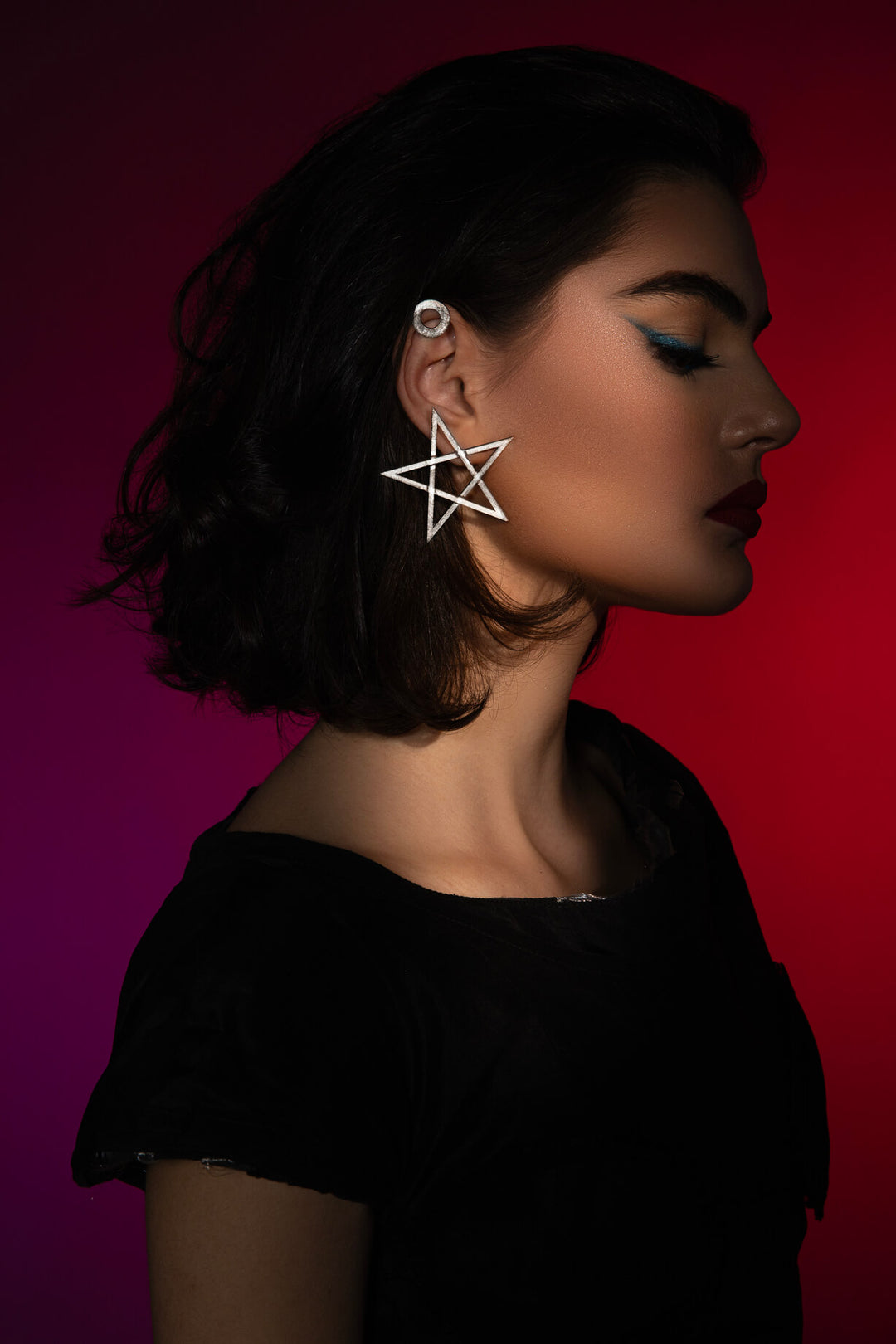 The Mystic Pentagram Earrings, a unique avant-garde statement accessory, is designed to empower dark feminine energy. Ethically handmade of Sterling Silver 925.