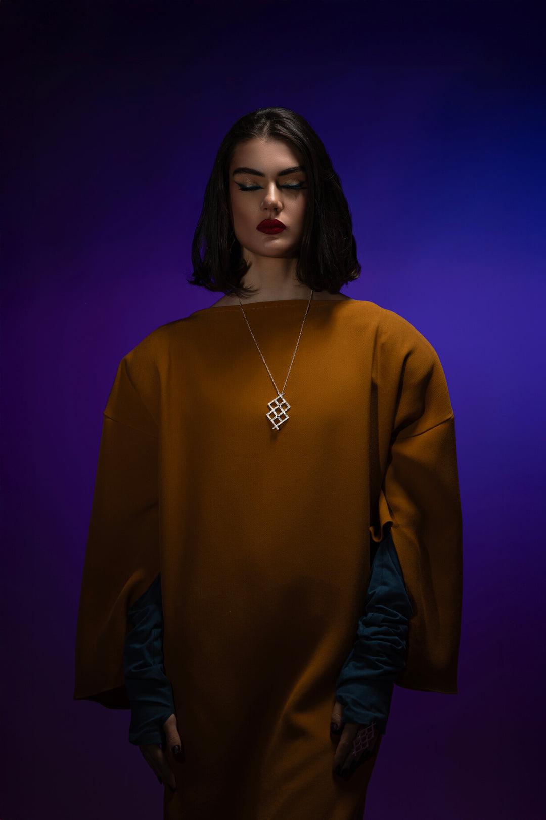 WishRune Necklace: Geometric avant-garde statement design with jet stones, inspired by runes believed to grant wishes. Wish it. Wear it. Own it.