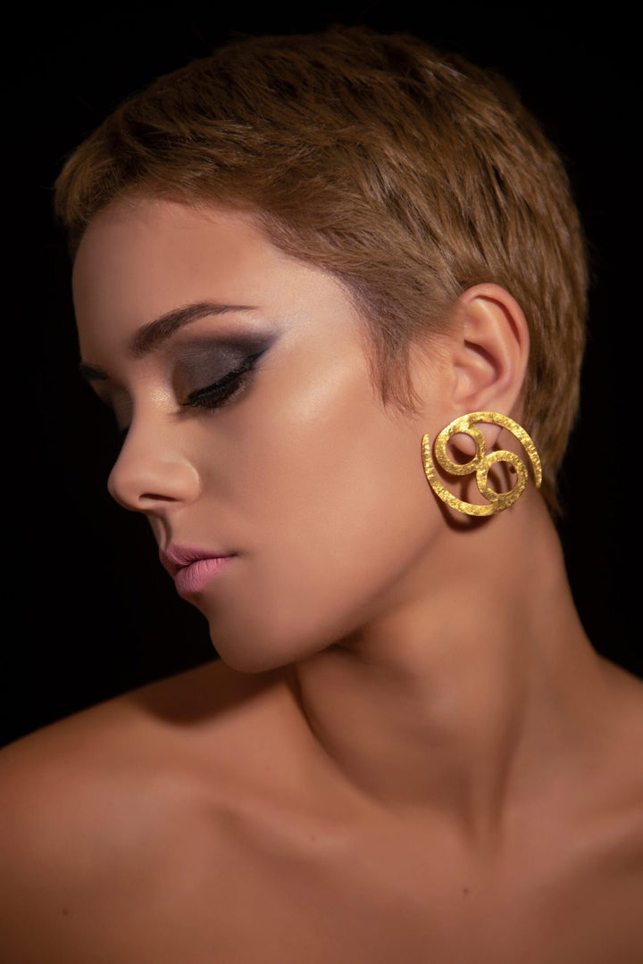 Unique Avant-garde statement Cancer Earrings ethically handmade of 18K Gold. #material_18k-gold